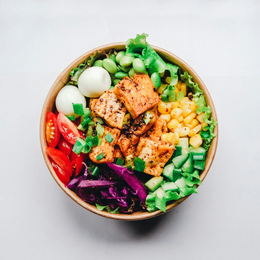 Balanced plate of vegetables and protein to avoid overeating when breaking a fast