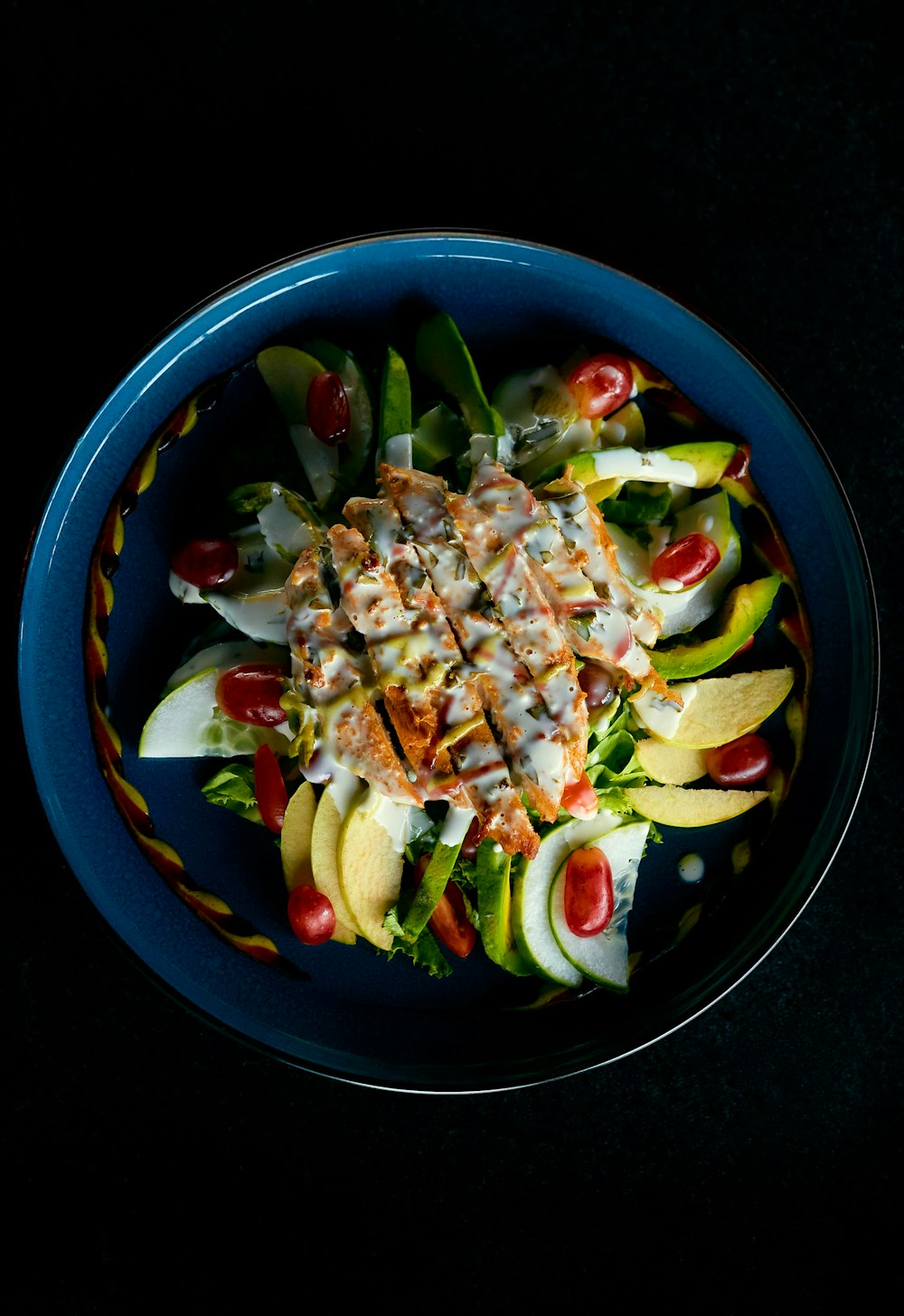 Grilled chicken salad with avocado, a good way to break a fast