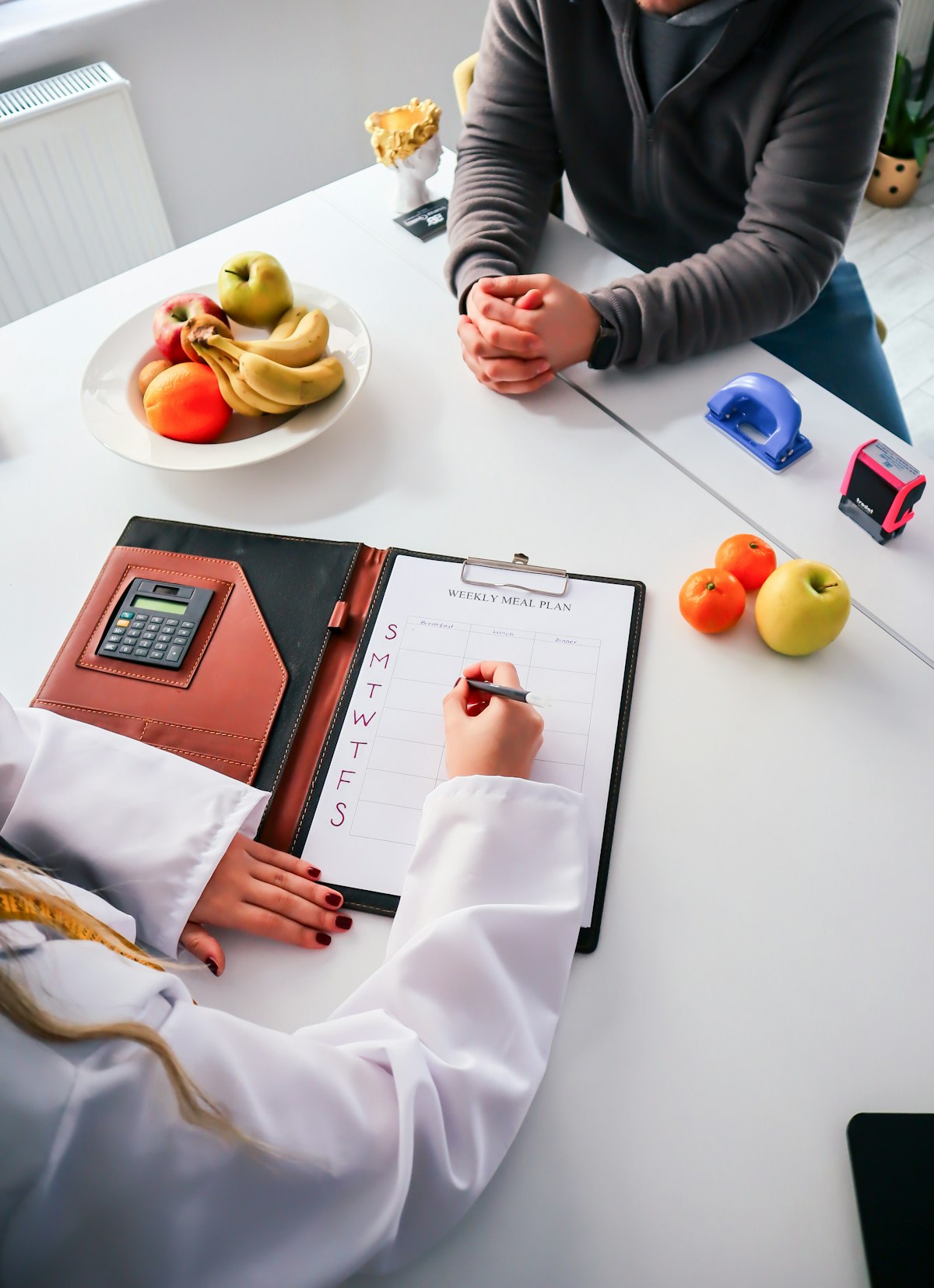 Registered dietitian reviewing a nutrition plan with a client