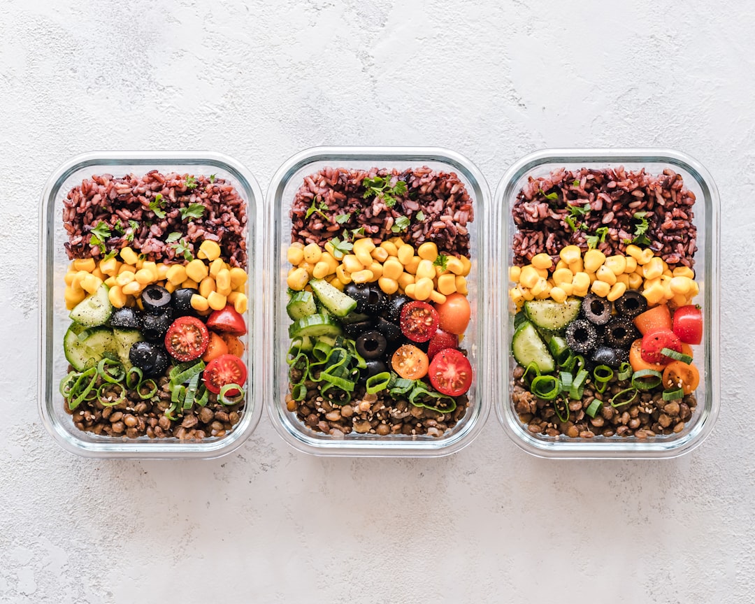 Colorful salads on white plates showing low calorie density and high satiety meals