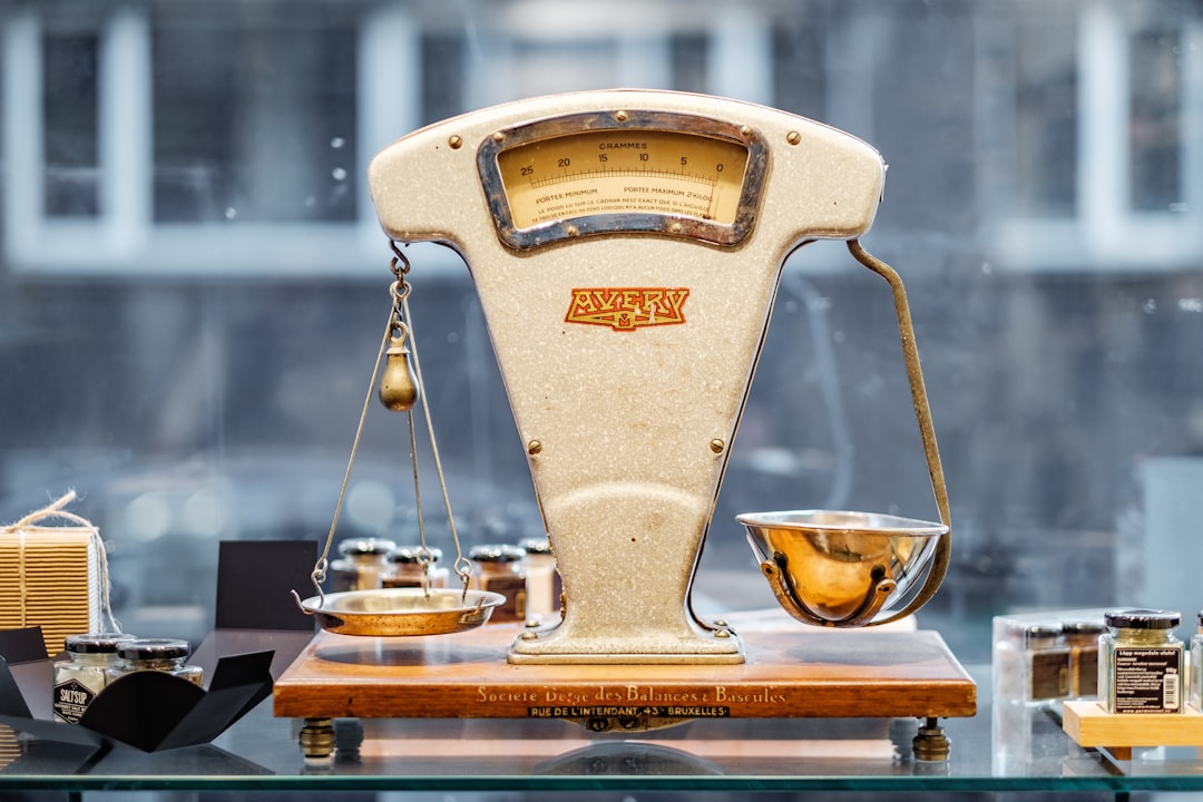 Kitchen scale on a light counter, a symbol of the precise measuring a nutrition label expects