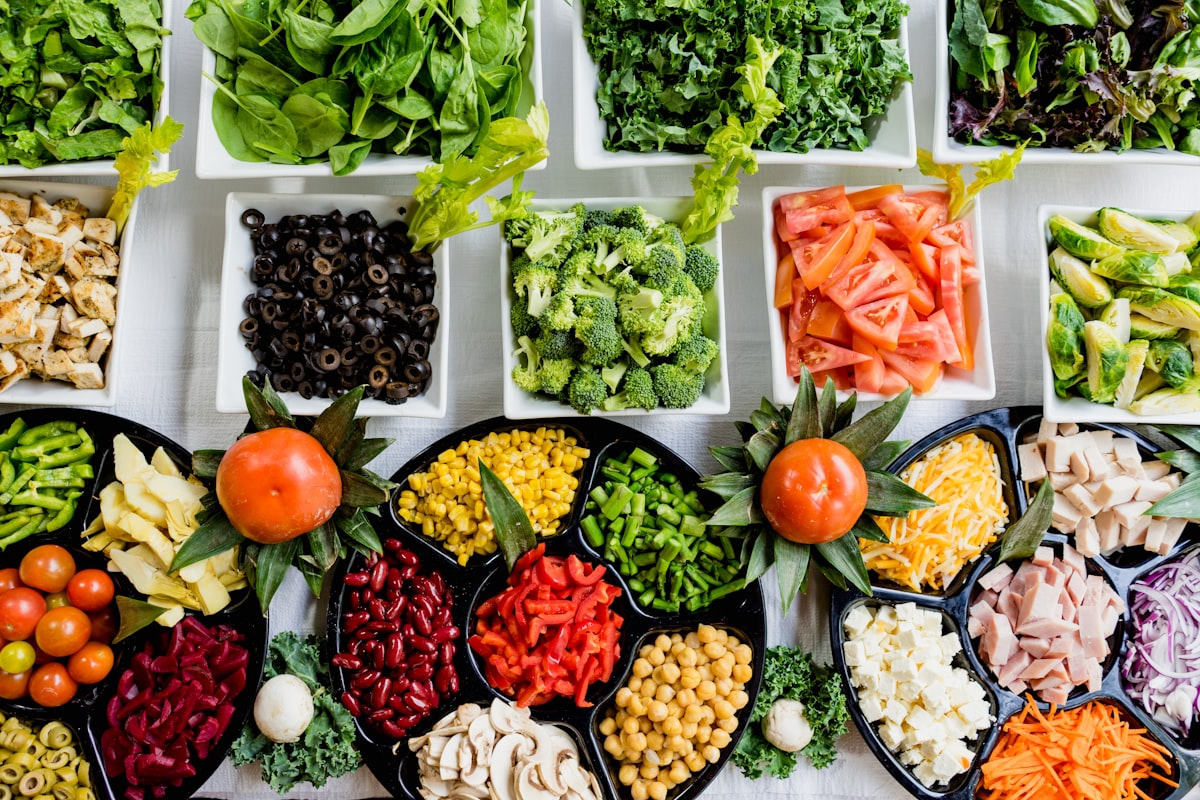 Bowl of colorful, nutrient dense food, the base of the food and mood side of wellbeing