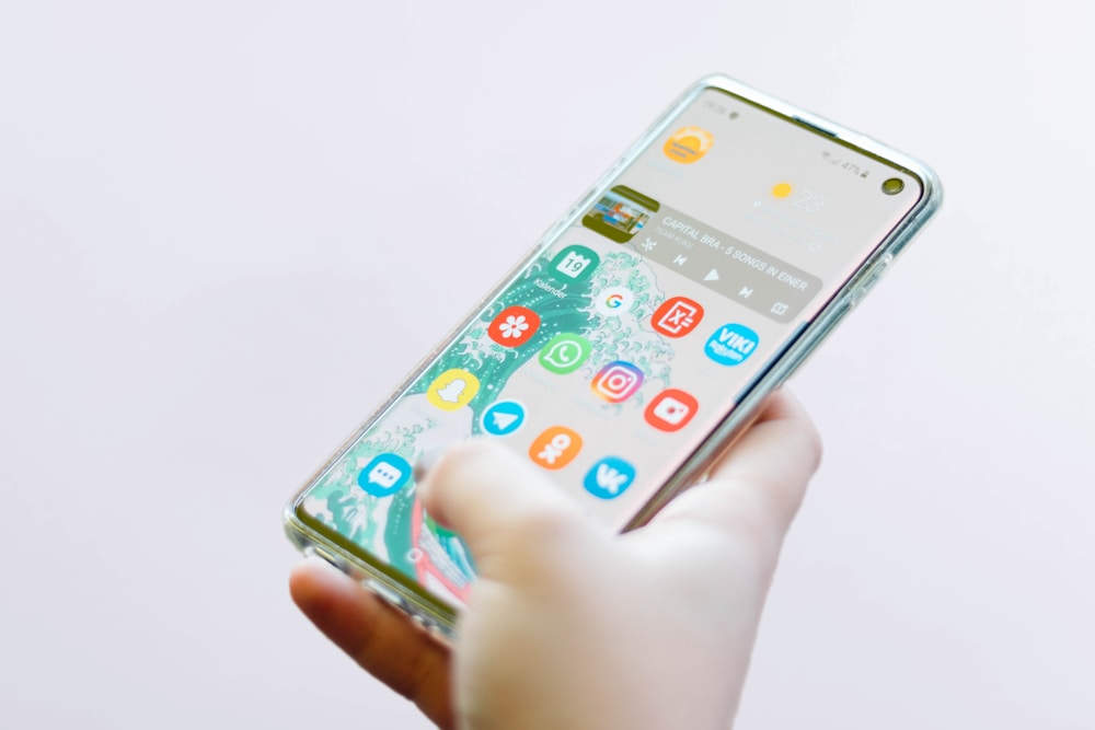 Person using a phone to compare calorie counting apps
