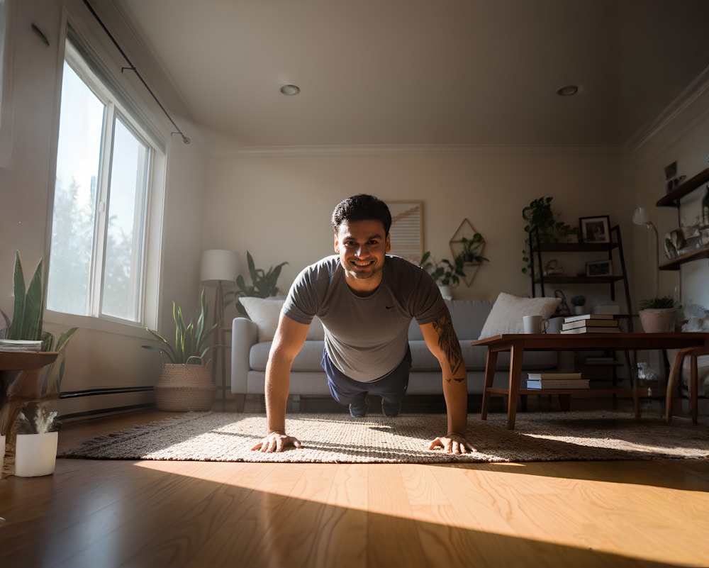Man doing a push-up at home as part of a HIIT workout at home circuit